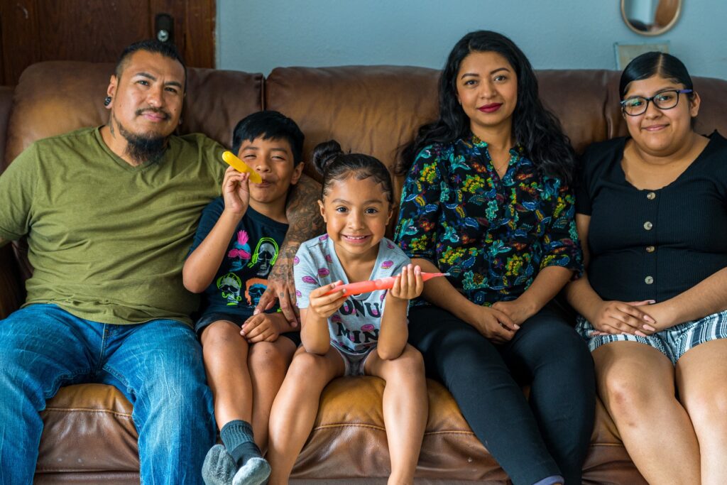 Acts homeowners Horacio and Maria with their family