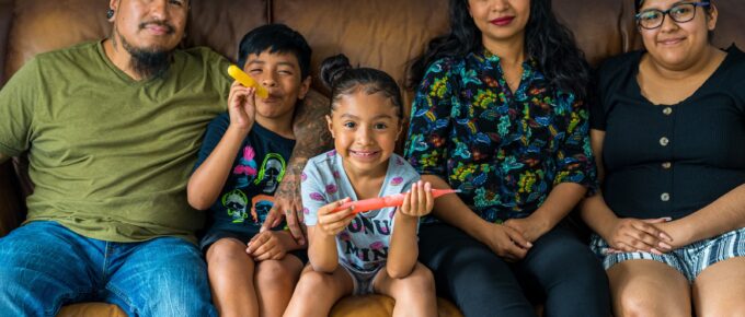 Acts homeowners Horacio and Maria with their family